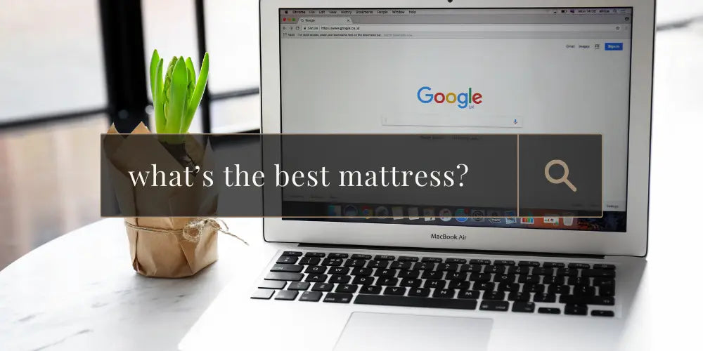 Computer opened to google search and typing in "what's the best mattress review?"