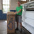 Aaron Pullan, third generation mattress maker, boxing a deluxe mattress with precision