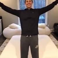 Carli Lloyd of the USA women's soccer team enjoying a soft landing on her new DLX mattress.