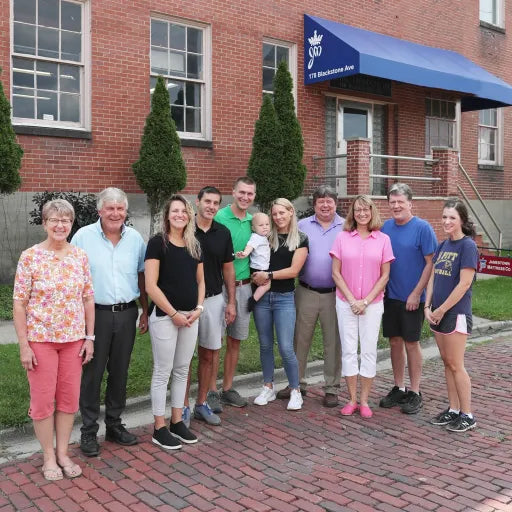 3 Generations of the Pullan family, owners of DLX Mattress, outside their manufacturing facility.