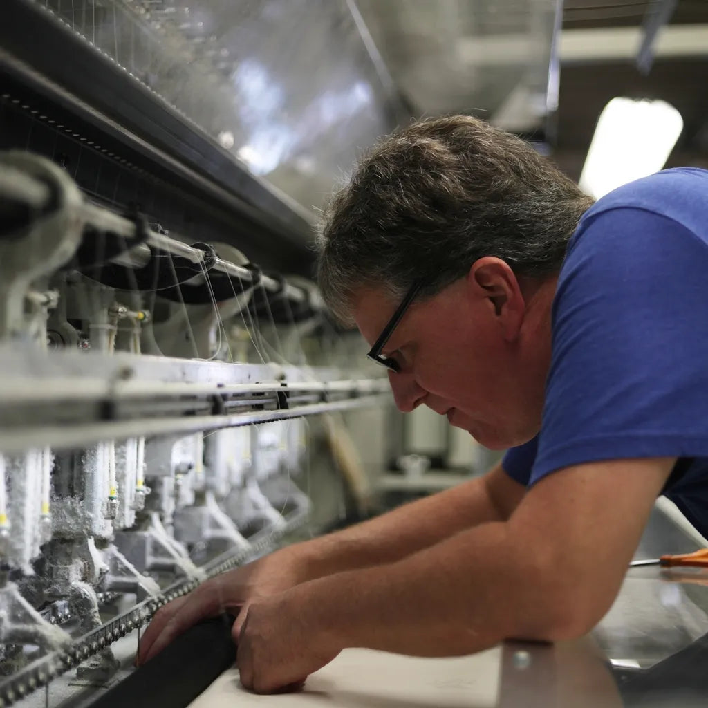 Art of Quilting in New York: Layering of high-grade fibers and foams for DLX mattresses ensuring comfort and adaptability.